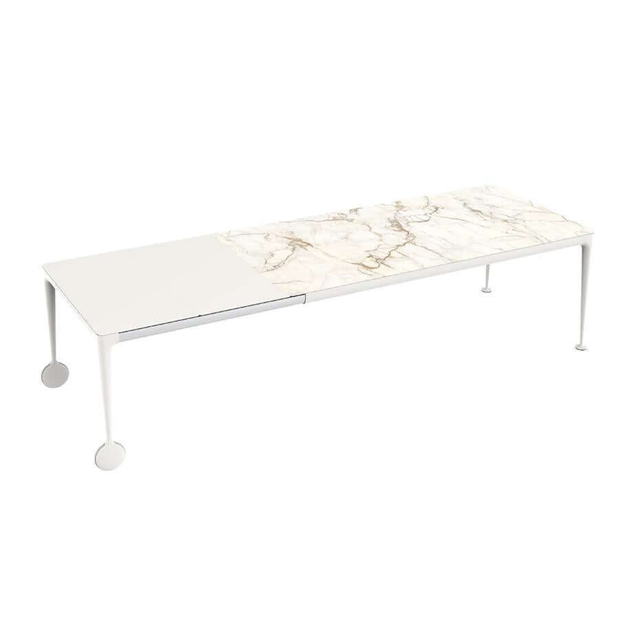 tavolo bianco piano in marmo allungabile magis