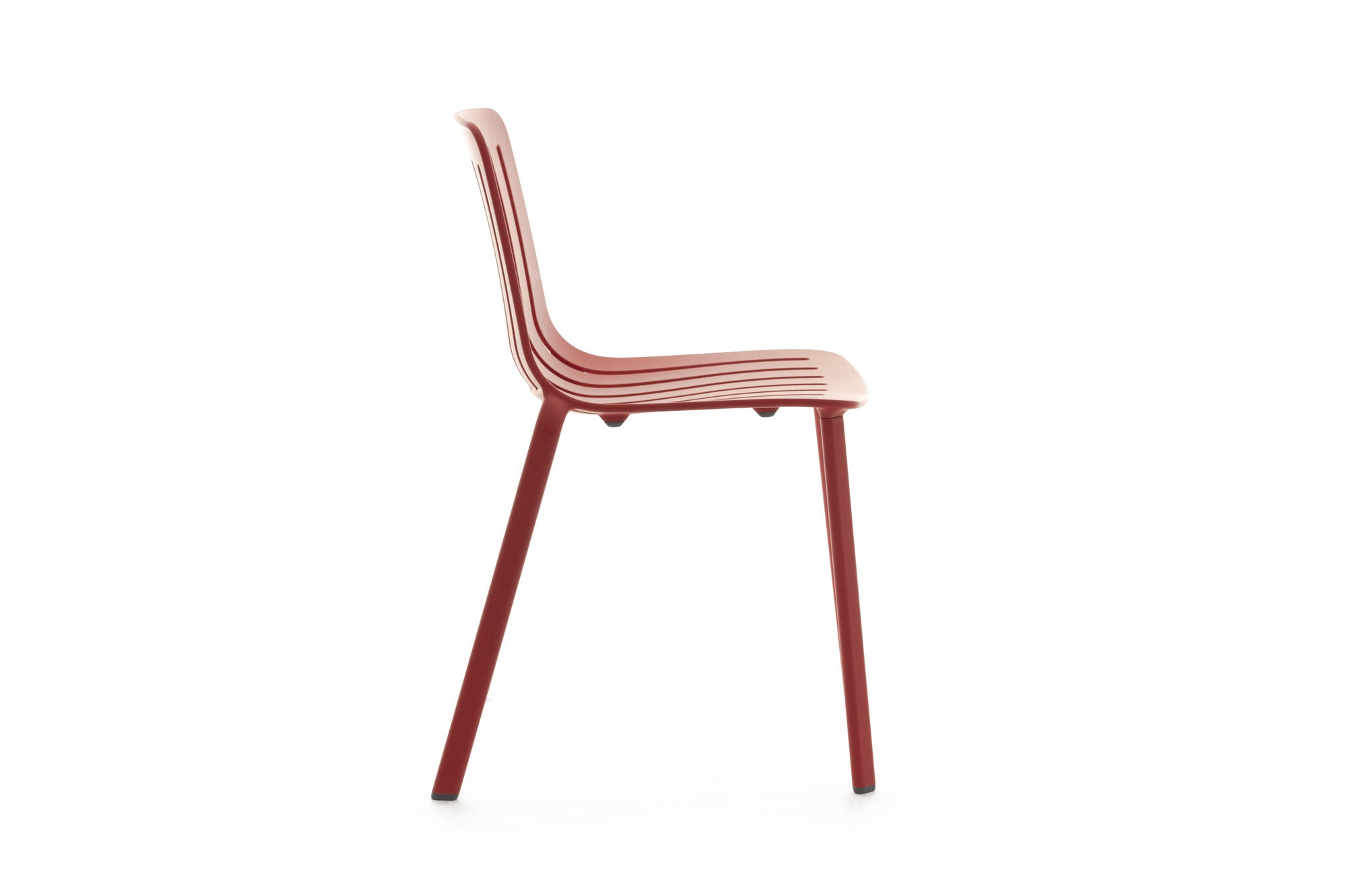 Sedia Plato Magis rossa alluminio pressofuso vista laterale profilo curvato sedile ergonomico contract