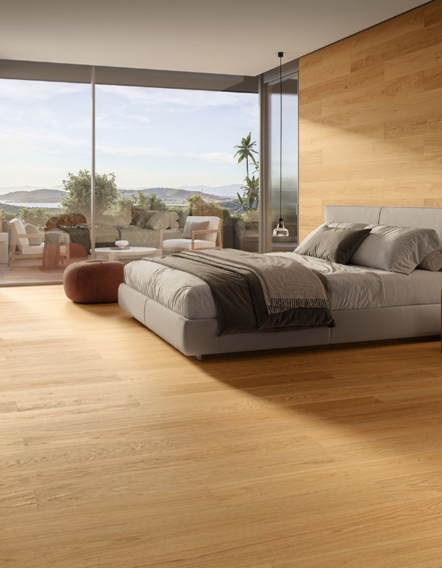 Camera da letto con parquet in Rovere Venezia Palladio Skema, vista su terrazza e parete rivestita in doghe dello stesso legno.
