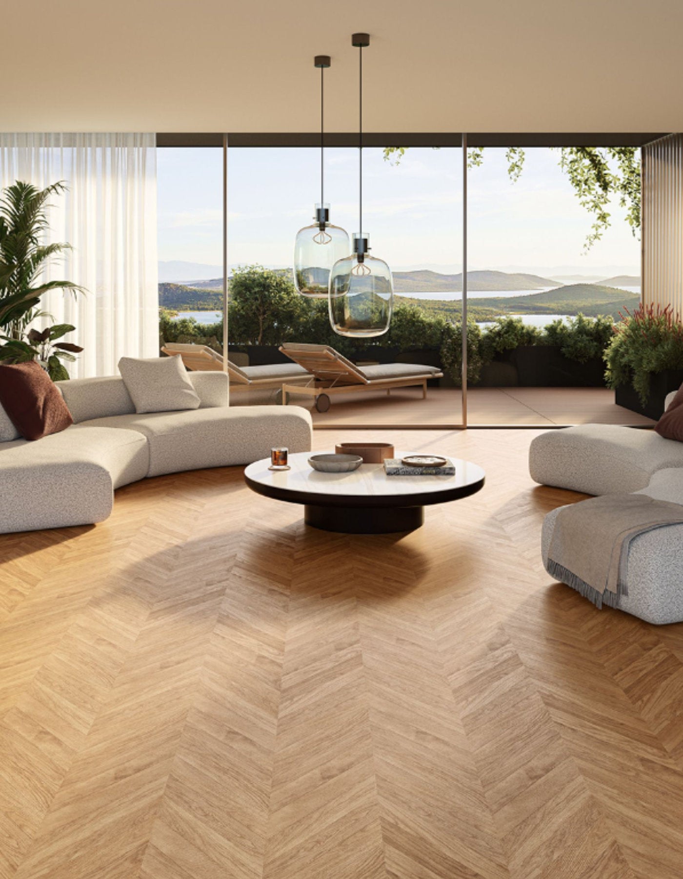 Salotto con divani chiari e pavimento laminato Skema in posa spina ungherese rovere naturale