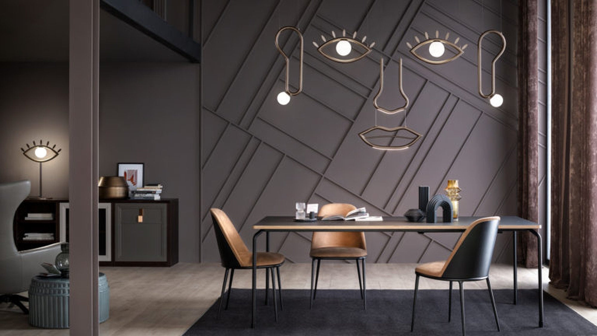 Lampada a sospensione Visio Masiero ispirata al volto umano, in ambiente living contemporaneo