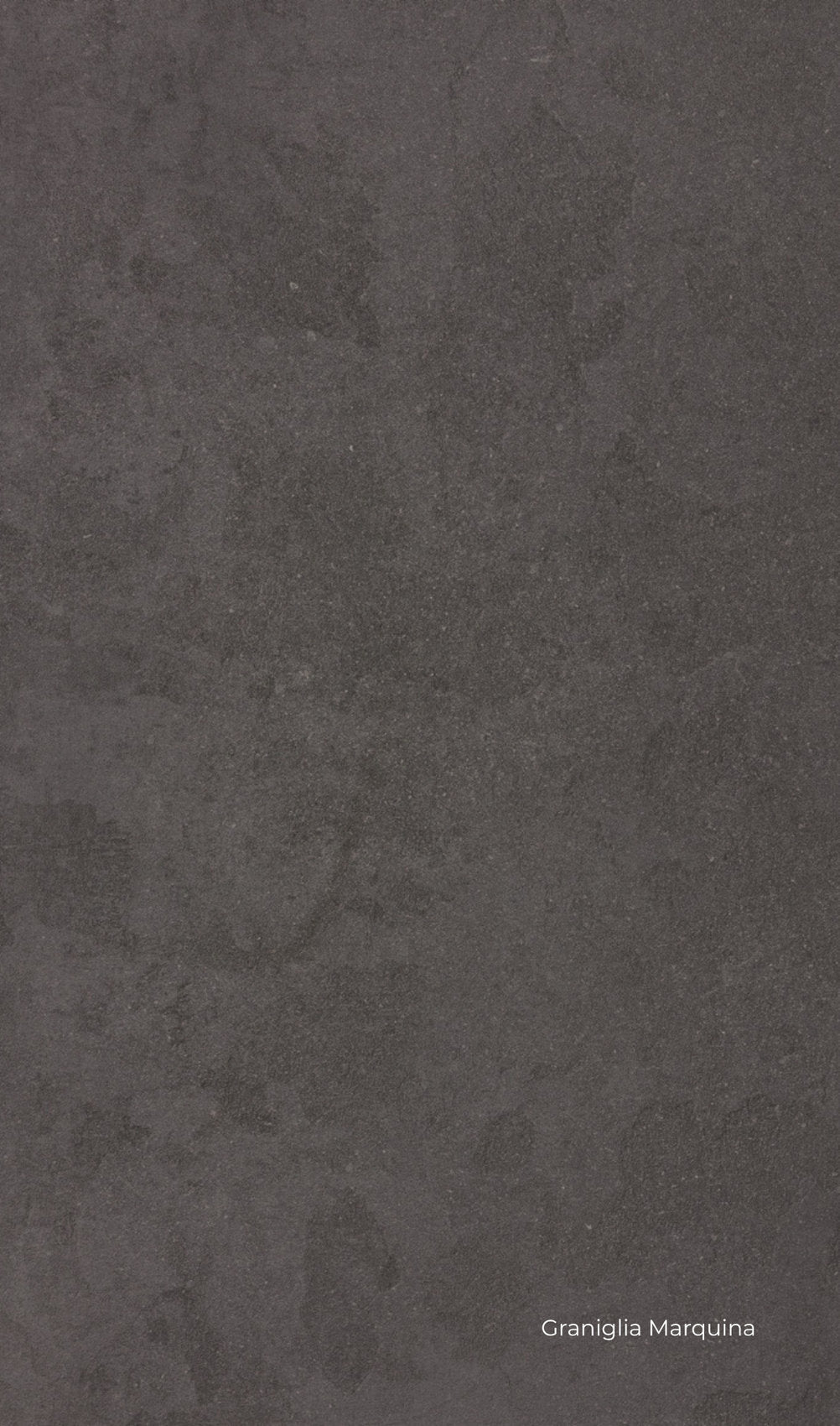 Pavimento in laminato Vision Oxid Skema in finitura graniglia Marquina, tono scuro e profondo