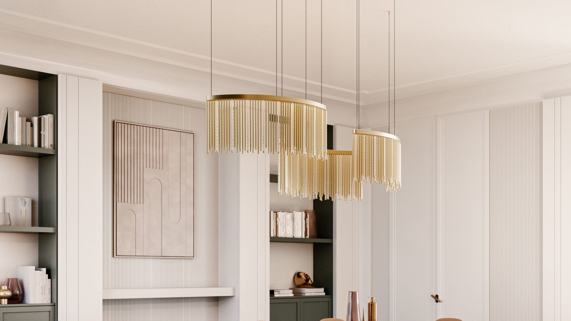 Lampada Masiero Lustralis SA1 SNG con tre moduli a sospensione dorati, installata sopra tavolo da pranzo in ambiente domestico con pareti chiare