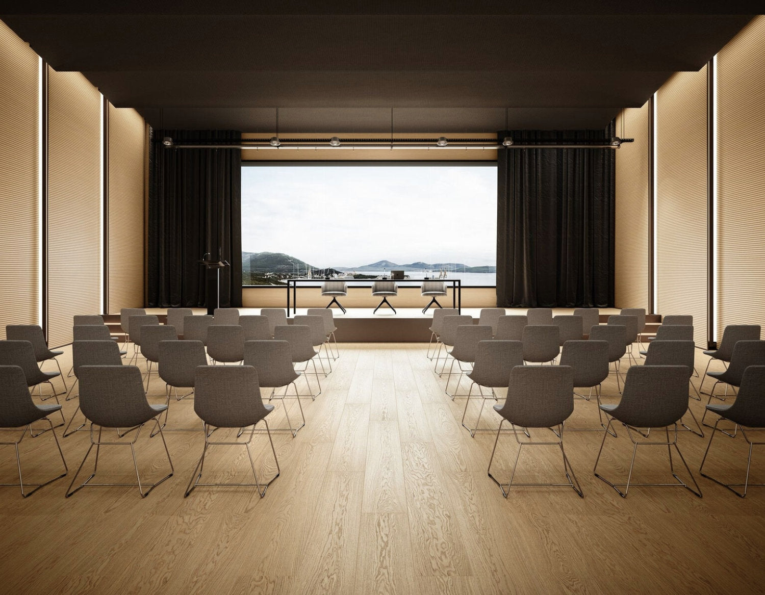 Sala conferenze con pavimento ibrido effetto rovere chiaro, sedute grigie e ampia vetrata con vista sul paesaggio