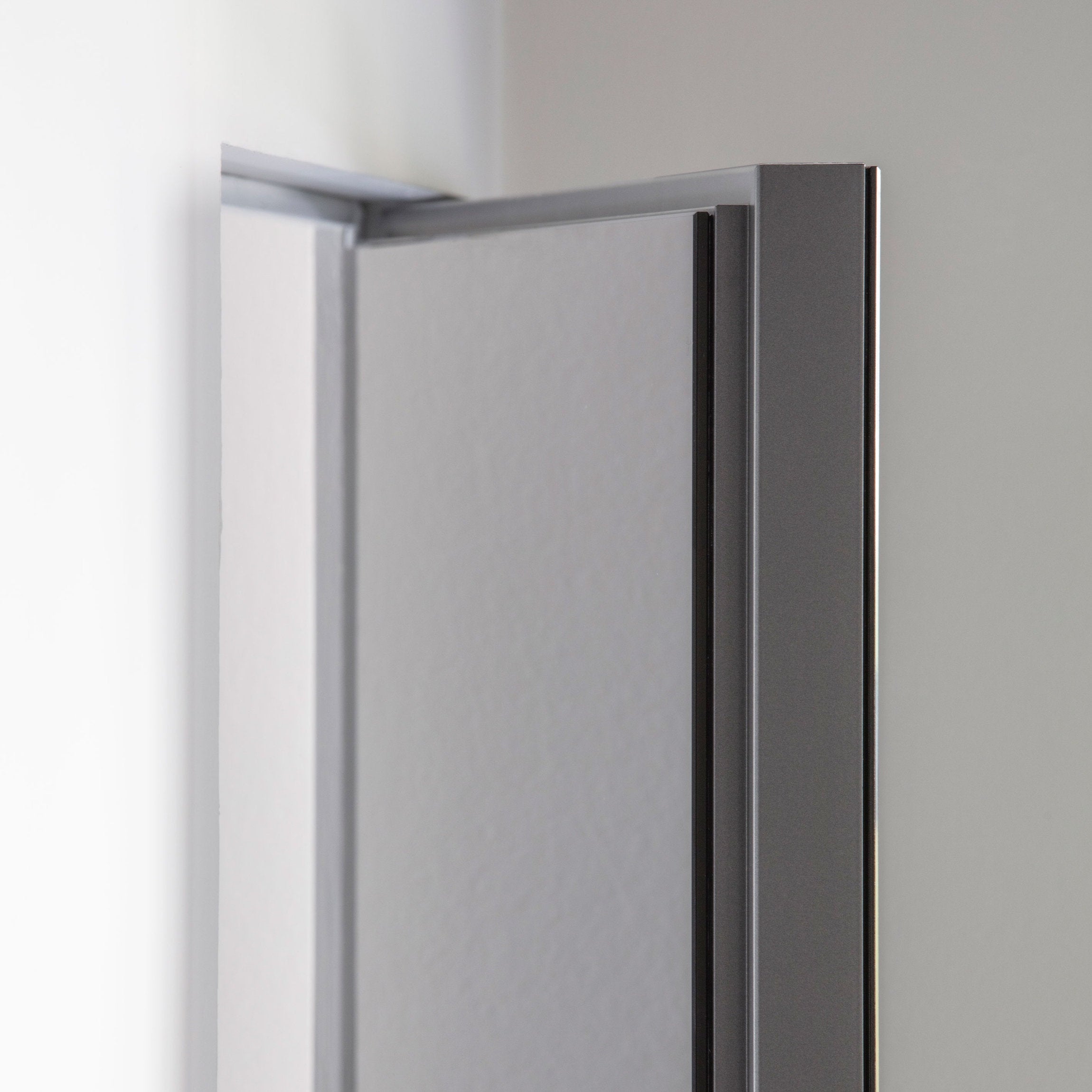 Porta battente filomuro in vetro Viva Porte con anta complanare spessore 60 mm