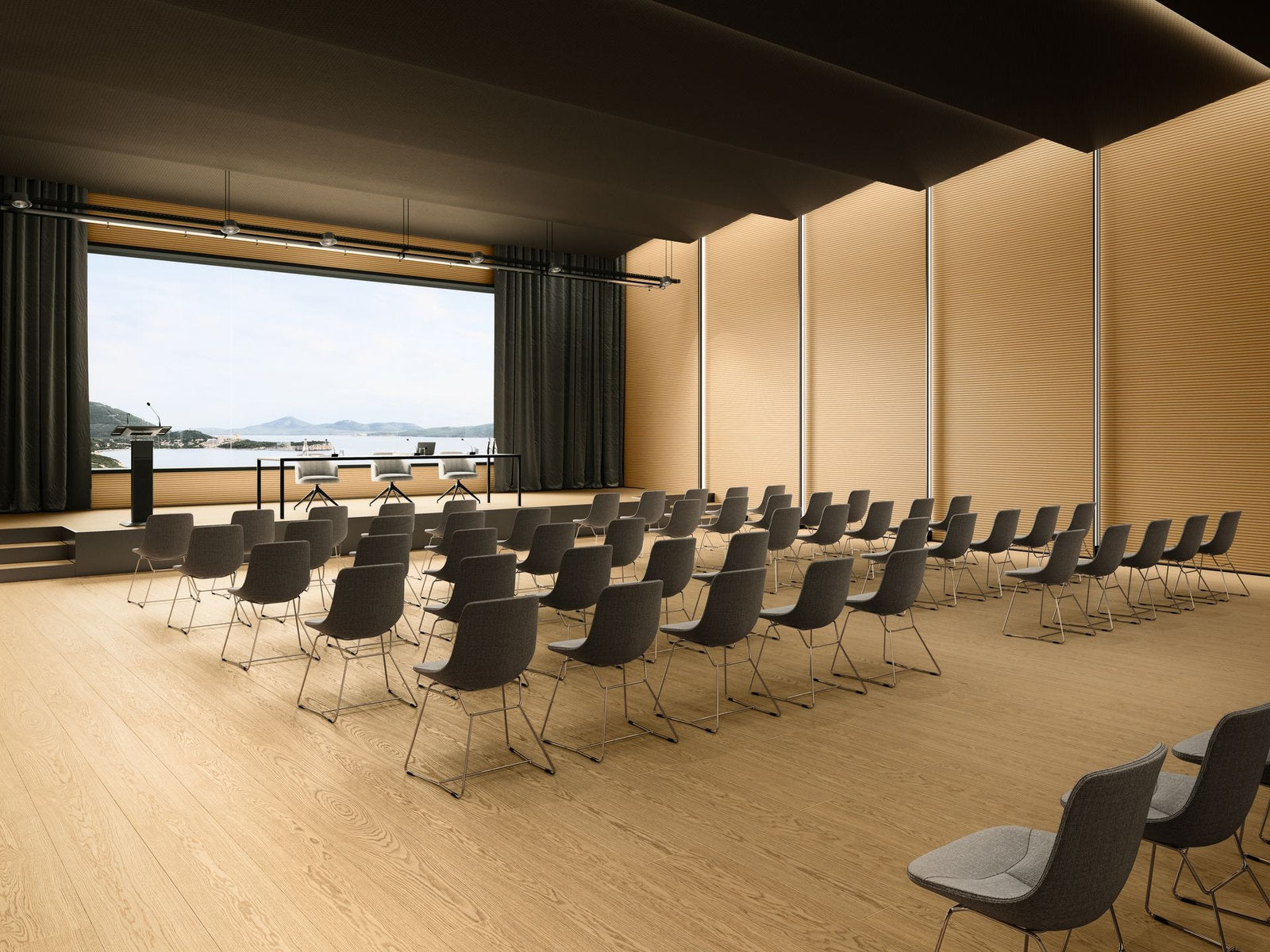 Vista ampia del Rovere Conero Lumbertech 270 in un auditorium con sedute in tessuto e palco per eventi