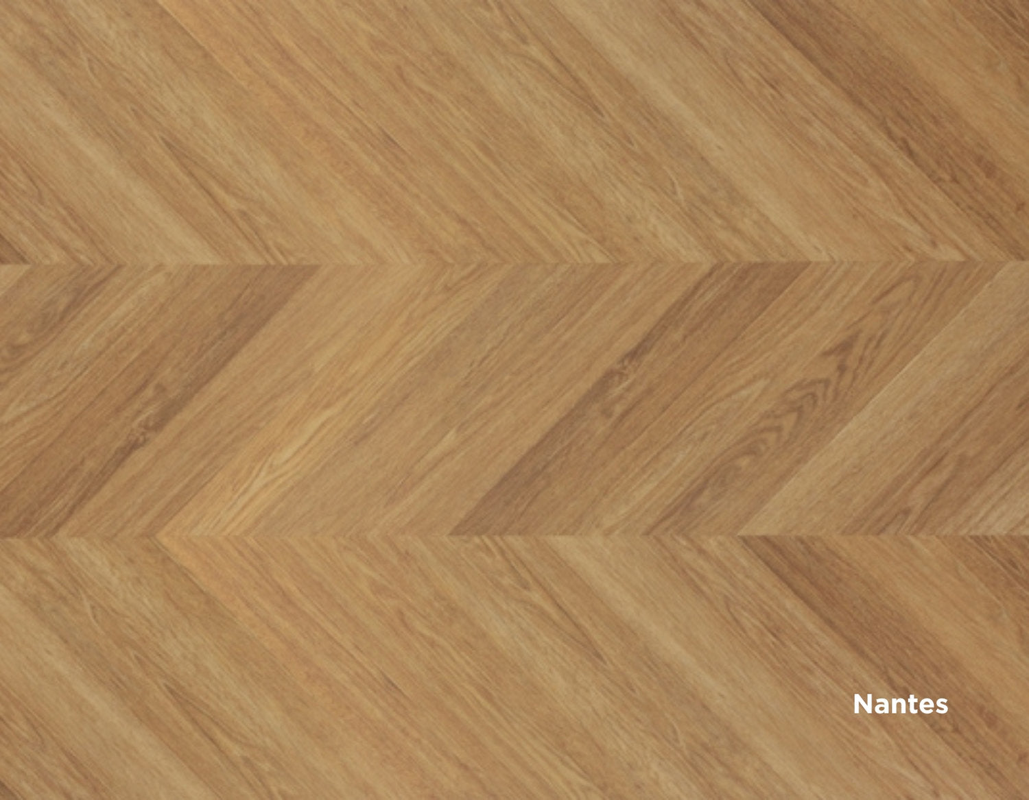 Dettaglio finitura Nantes del pavimento SPC Star Ks Skema in posa a spina francese, con venature rovere chiare