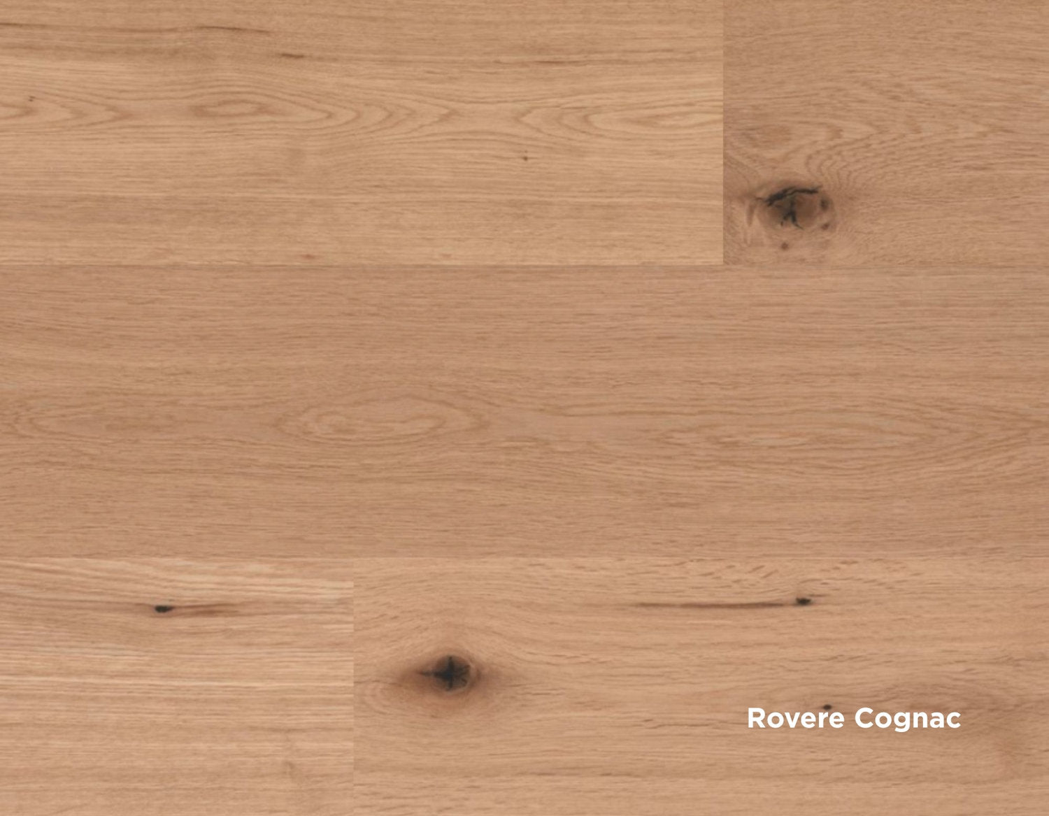 Dettaglio di doga pavimento Skema Star Wood, finitura Rovere Cognac, con toni caldi e nodi naturali a vista