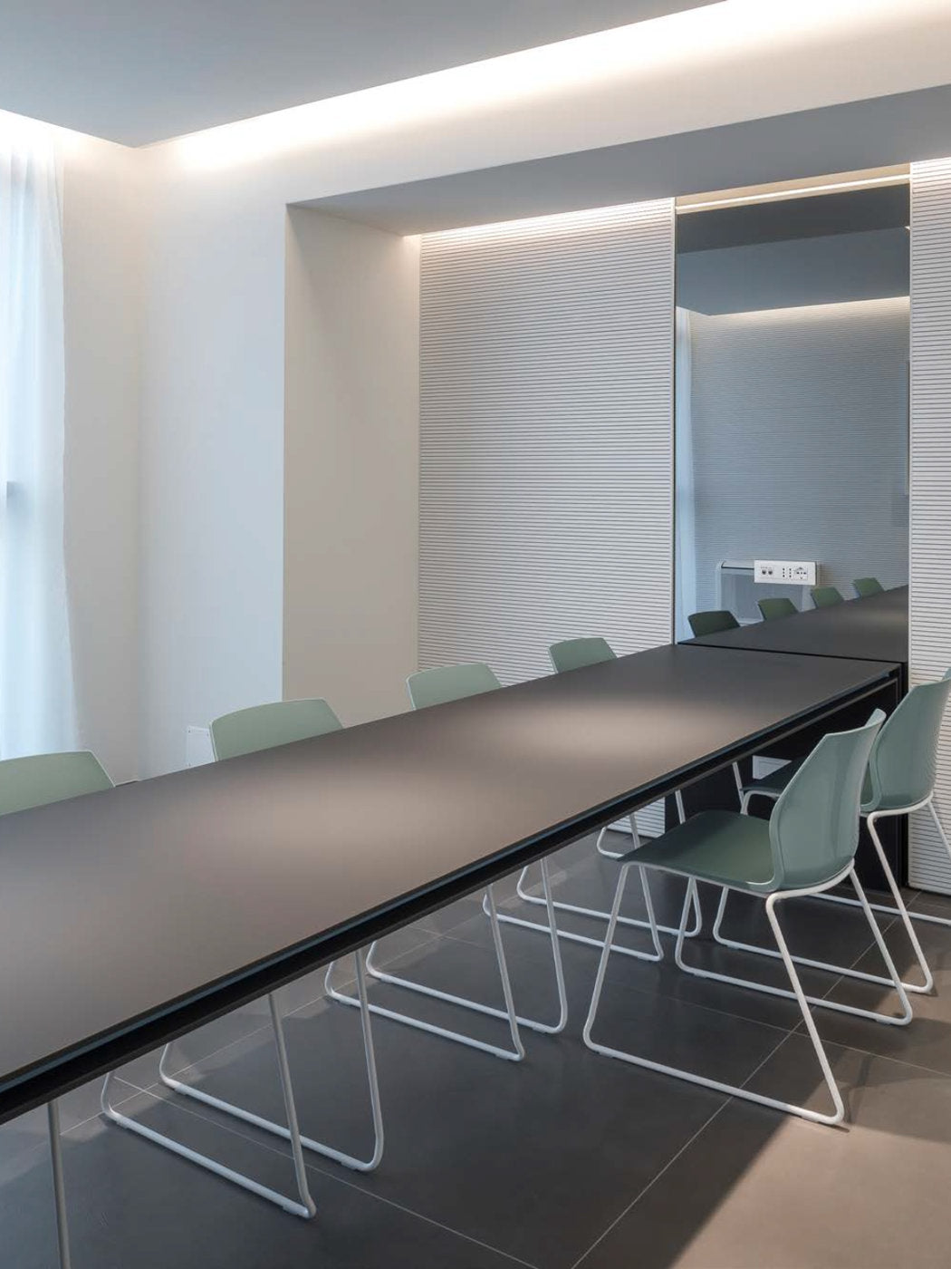 Rivestimento fonoassorbente Skema per correzione austica ufficio sala riunioni