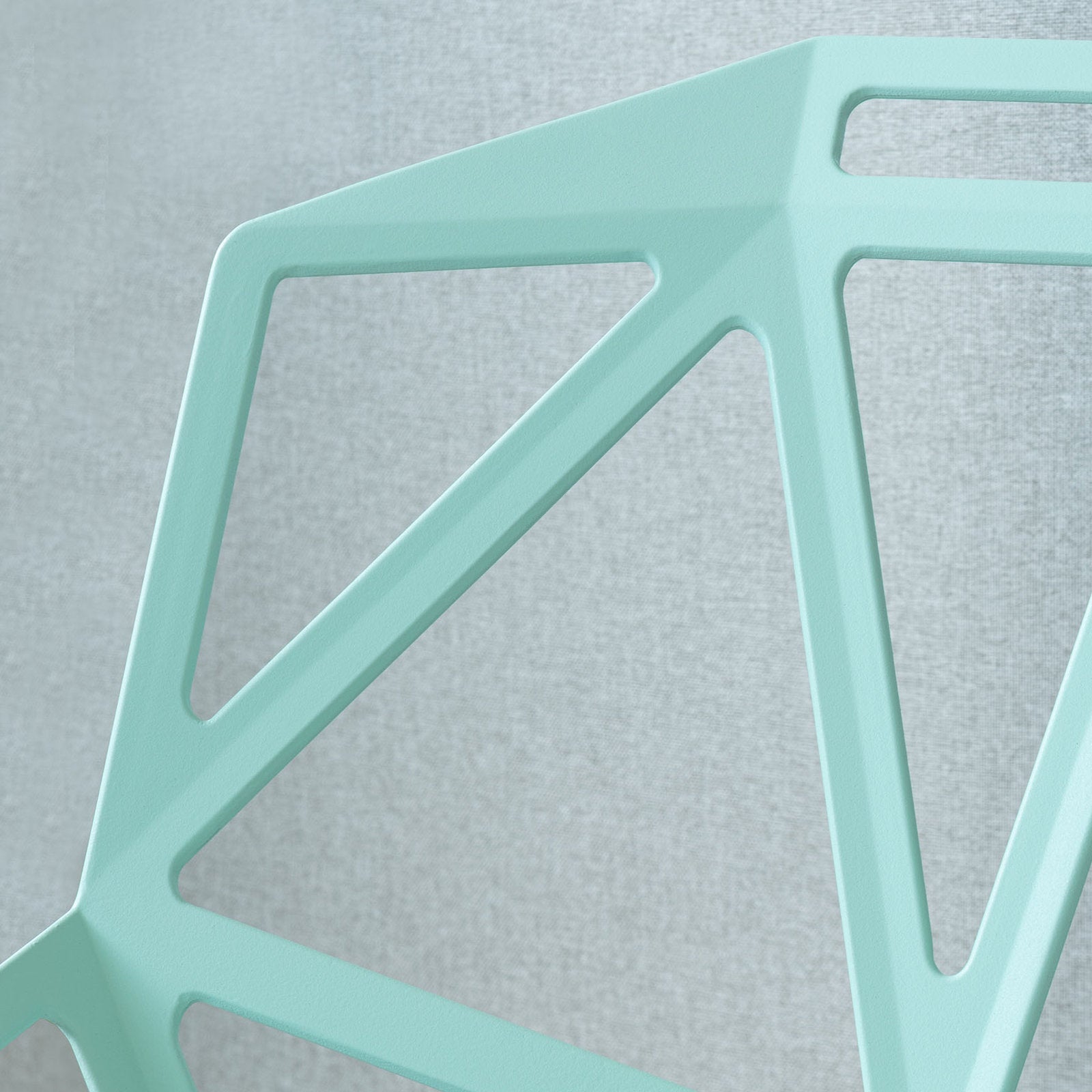 Particolare della seduta in alluminio verniciato della Chair One Magis in finitura verde chiaro