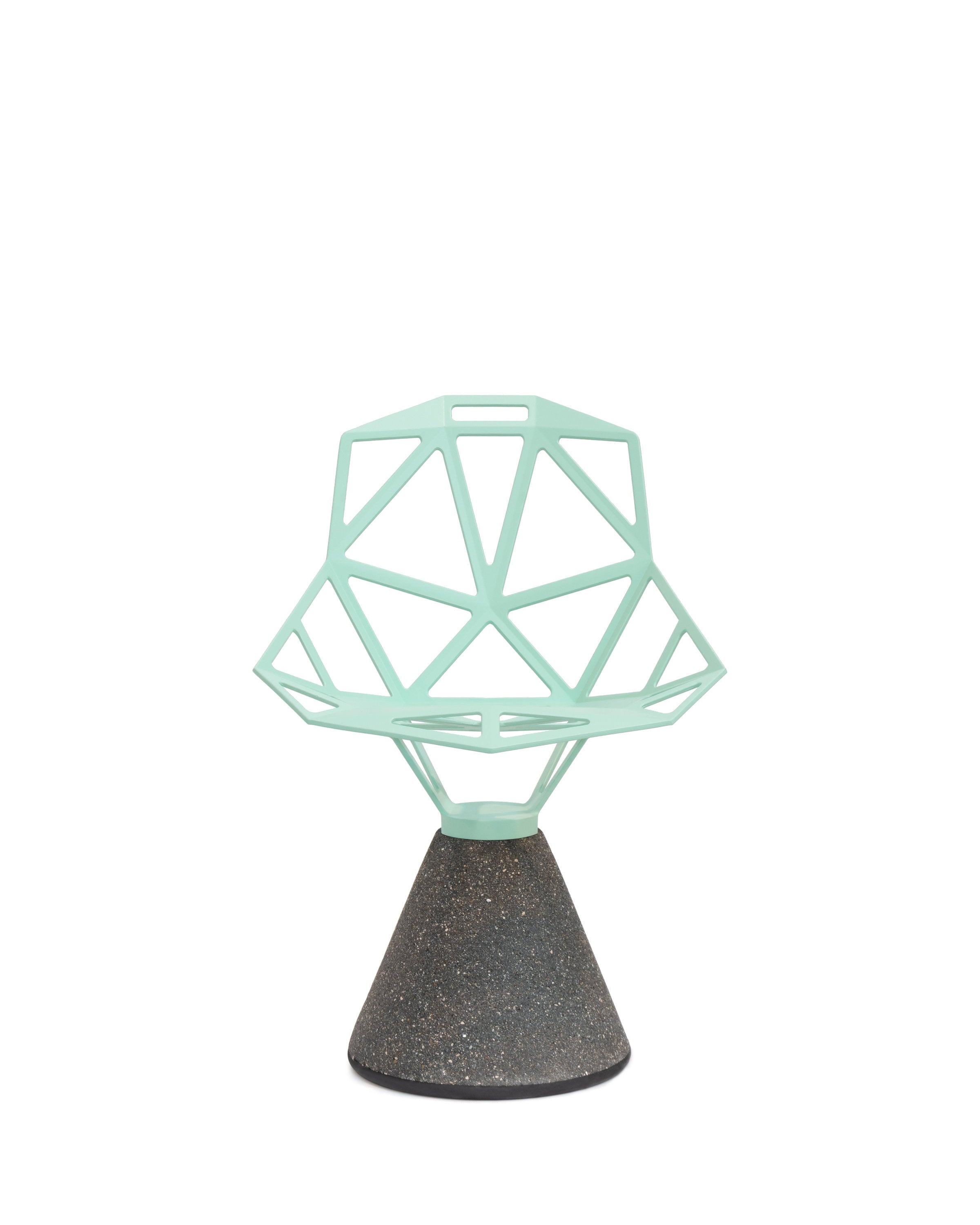 Sedia Chair One Concrete Magis in finitura verde chiaro, su fondo bianco, base conica in cemento