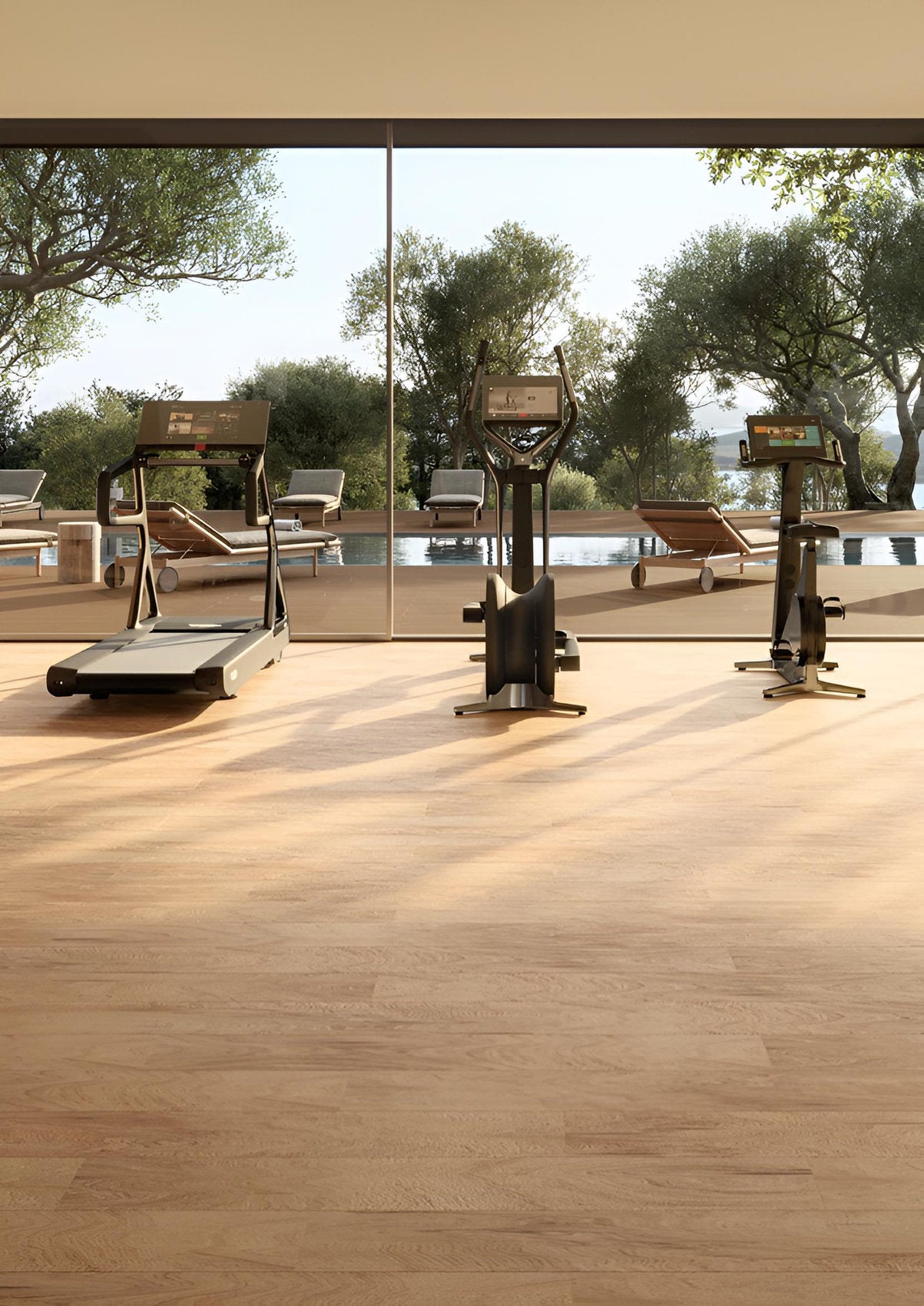 Pavimento laminato effetto legno rovere chiaro Skema Prestige Gold in ambiente palestra hotel