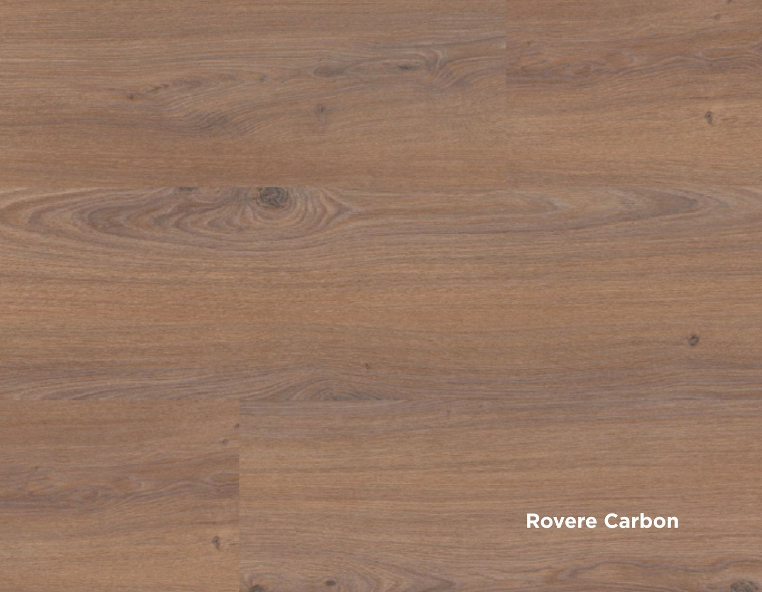Rovere Carbon di Skema, pavimento laminato con base marrone chiaro e stonalizzazioni grigie.