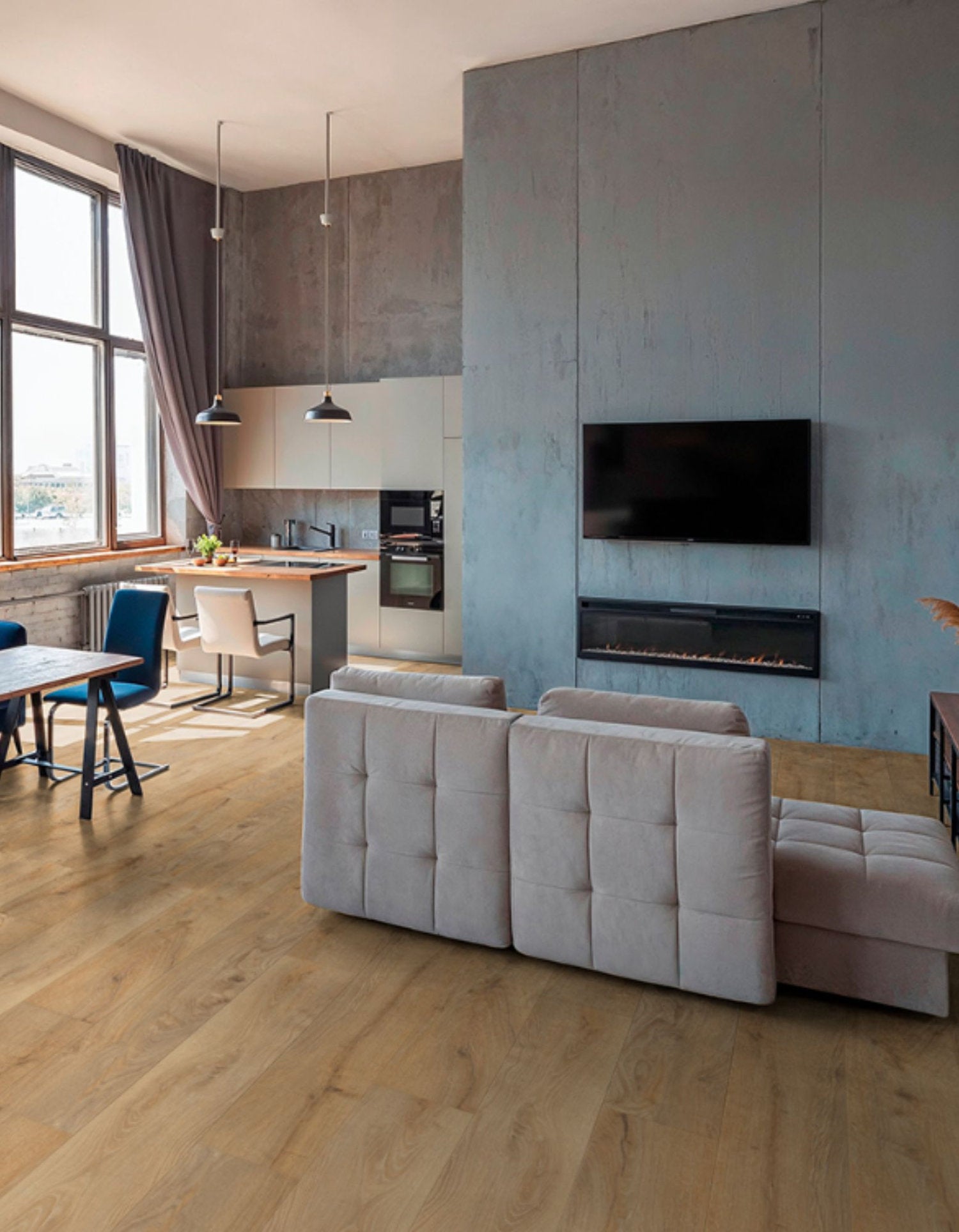Interno di soggiorno moderno con pavimento vinilico SPC effetto legno Quercia Francese della collezione Star KR di Skema
