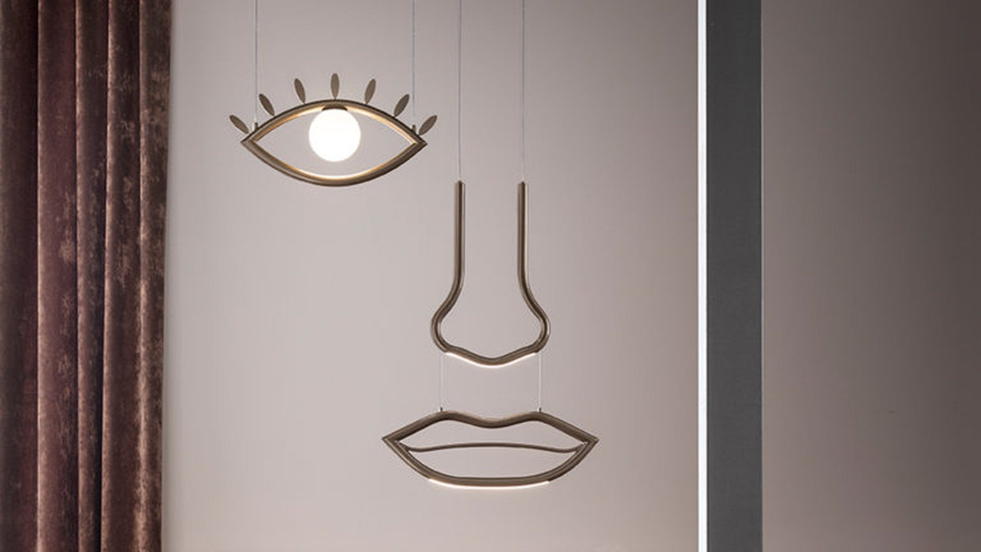 Particolare degli occhi, del naso e della bocca della lampada Visio Masiero by Nava e Arosio