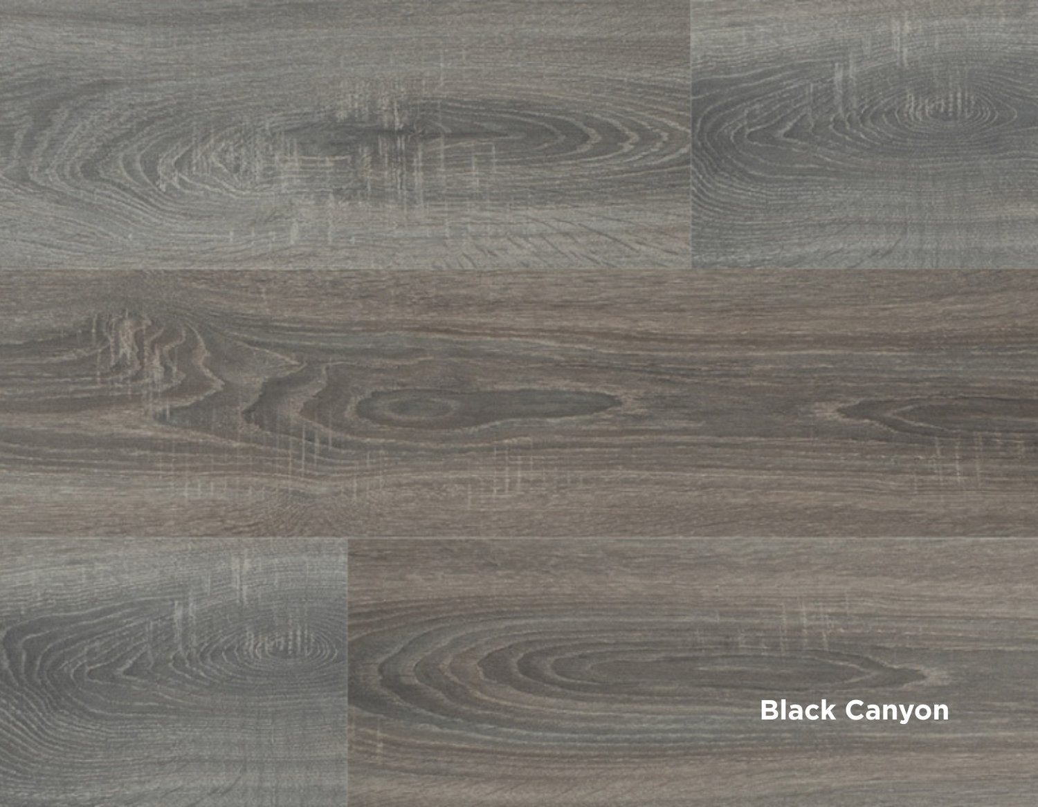 Doghe in laminato effetto legno scuro con venature marcate, finitura Black Canyon della collezione Facile+ di Skema