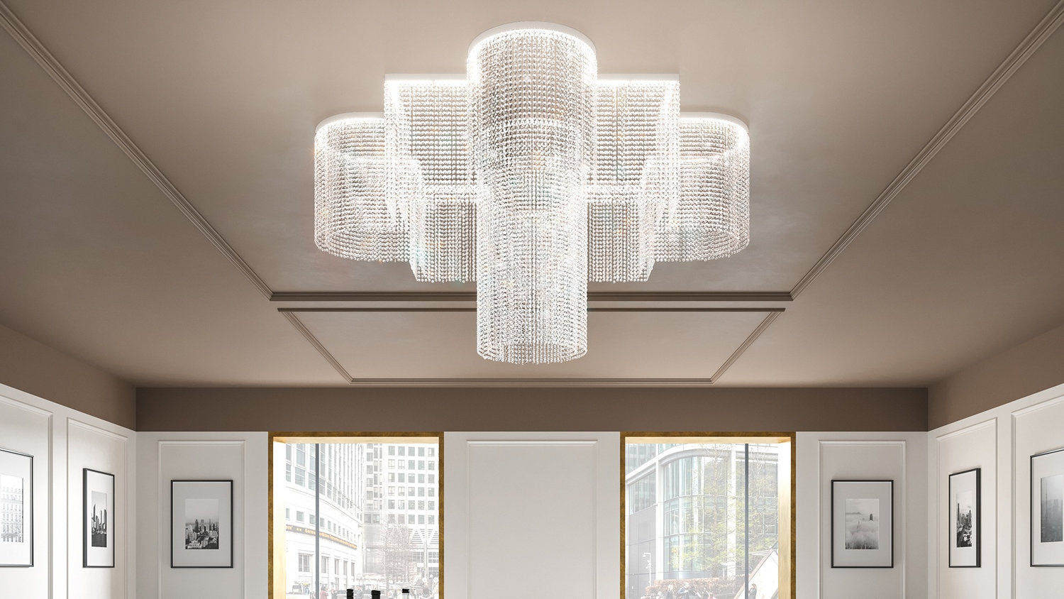 lampadario modulare Galassia Masiero con pendenti in cristallo di altezze differenti in living moderno