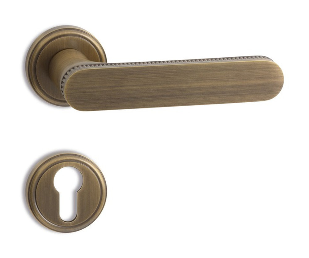 Maniglia Krone Salice Paolo in ottone bronzo graffiato con leva zigrinata per porta interna