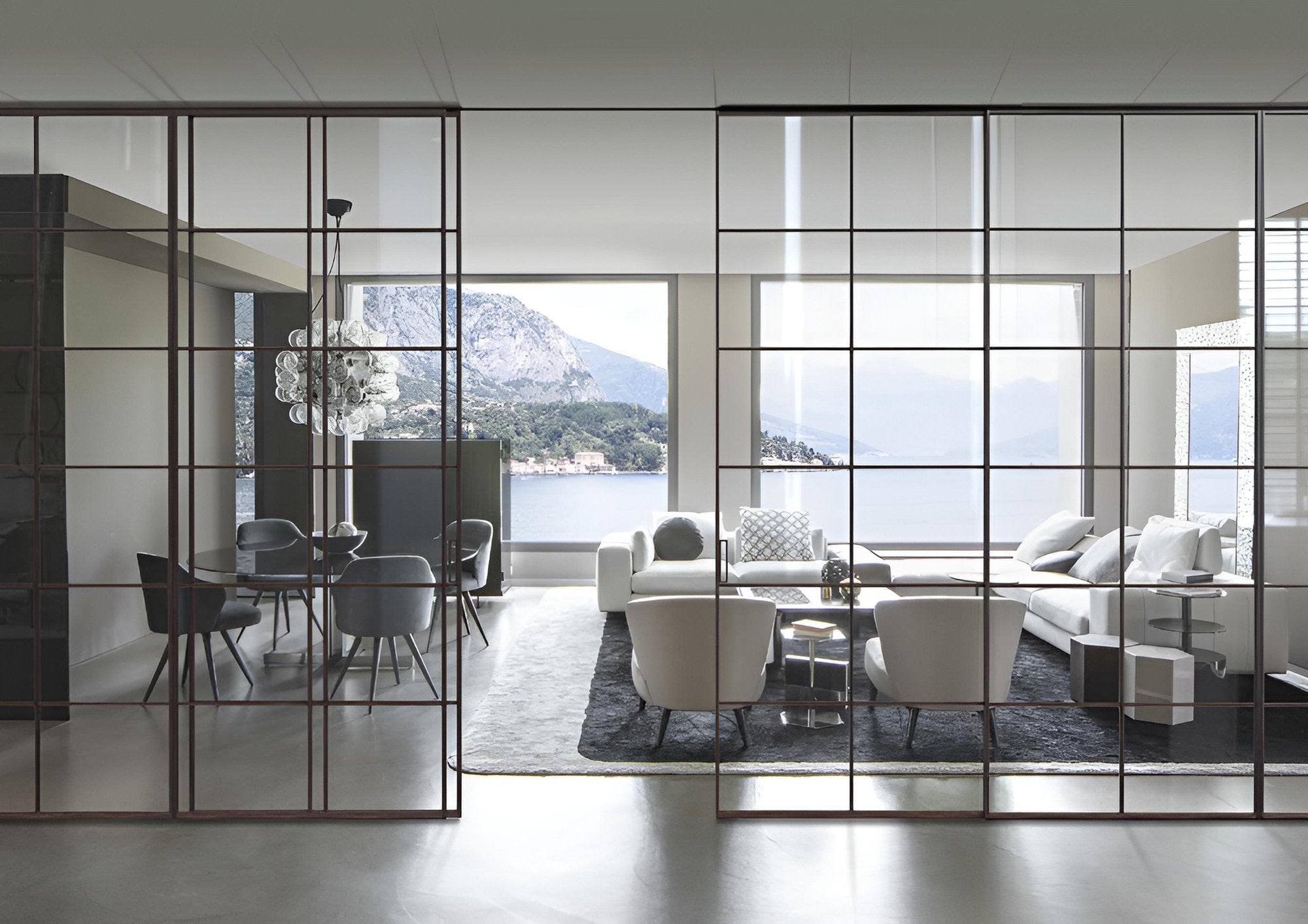 Vetrata divisoria scorrevole a griglia Viva Porte Bellagio Linee in vetro e alluminio, living open space