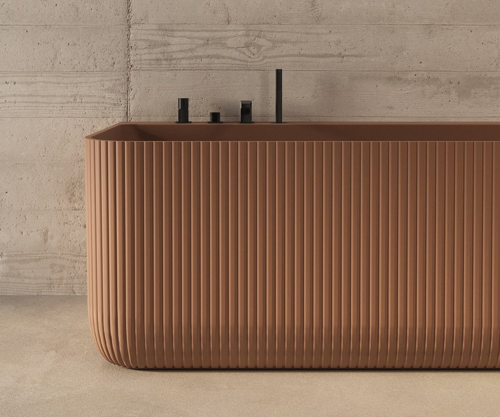 Vasca design a parete Oasi Selin di Forma Aquae cannettata color terracotta