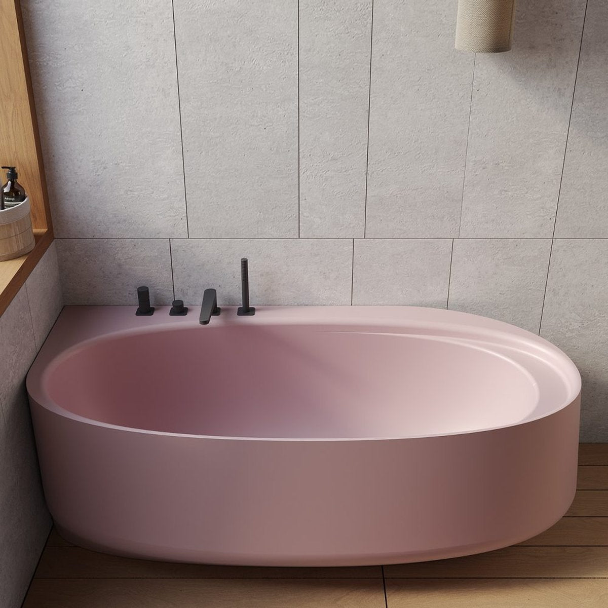 Vasca da bagno IKI angolare rosa con bordo arrotondato e rubinetteria a parete nera