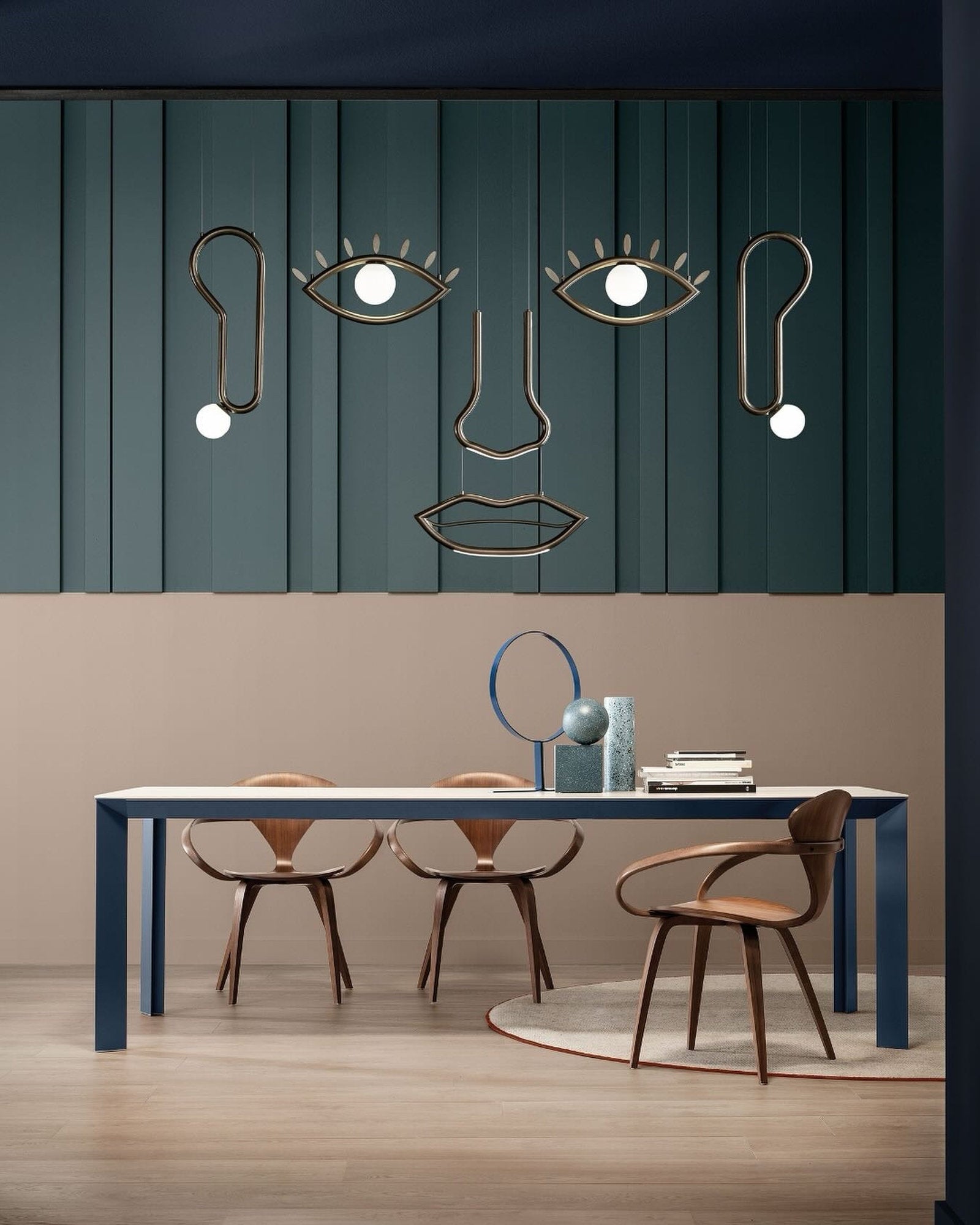 Composizione lampade a sospensione Visio Masiero che raffigura un volto umano in soggiorno contemporaneo
